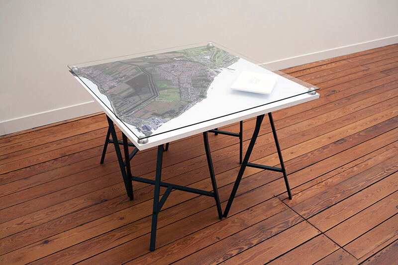 Book, essay, installation with table and map. Made at the artist-in-residency space the Kinderdijk Project. 2013